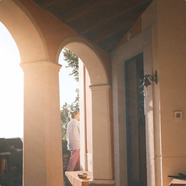 Sunlight through an arched porch